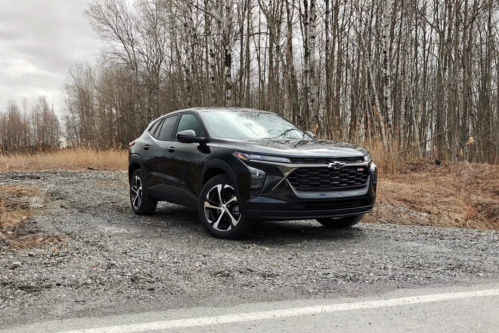 black 2026 chevy trax parked on a gravel road